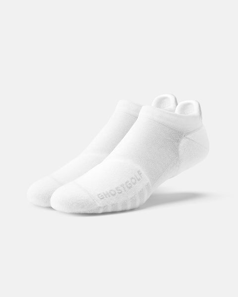 Front product shot of white ankle socks, with one sock featuring ghost golf #color_white