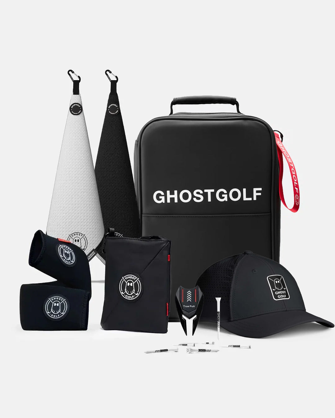 Product Shot of Katana Bundle showcasing 2 greenside magnetic towels, utility pouch, cart strap sleeve, golf hat, divot tool, and golf tees
