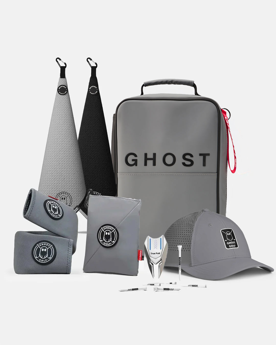 Product Shot of Maverick Bundle showcasing 2 greenside magnetic towels, utility pouch, cart strap sleeve, golf hat, divot tool, and golf tees