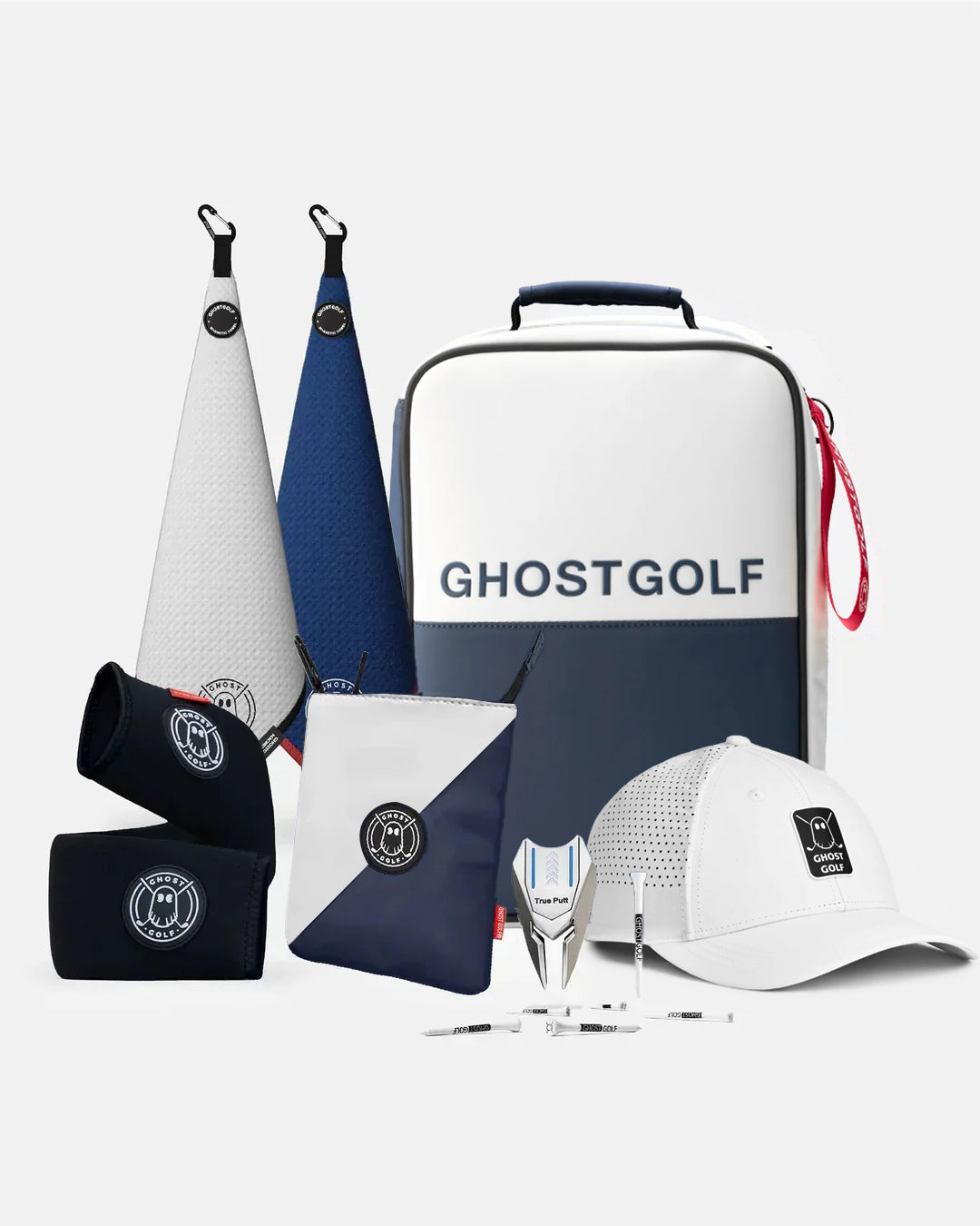 Product Shot of Valor Bundle showcasing 2 greenside magnetic towels, utility pouch, cart strap sleeve, golf hat, divot tool, and golf tees